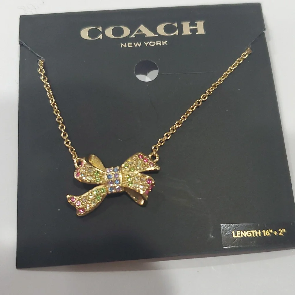 Coach multicolored pave crystals studded bow pendant necklace new‎